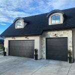 Brand new 1 – 10x8 r.12 insulated black plank door no windows (windows can be added)